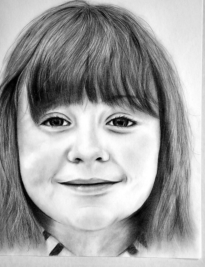 Graphite portrait of a young girl with bangs