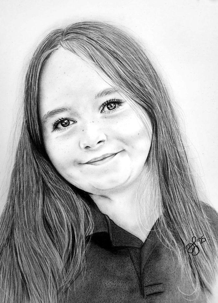 Graphite portrait of a girl with long hair