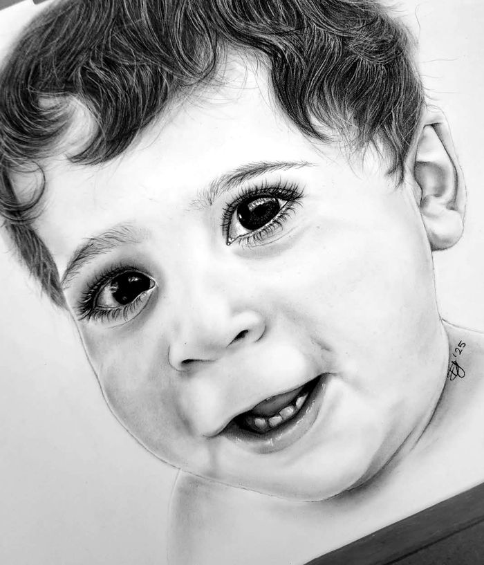 Graphite portrait of a smiling toddler